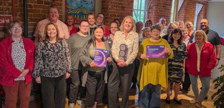 group scope awards A group of Circus Starr employees stand proudly with their Scope award.